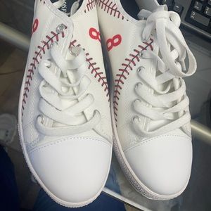 Like converse baseball shoes size 8 with #8 on it